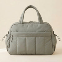 Sac à langer puffer sauge sur fond crème